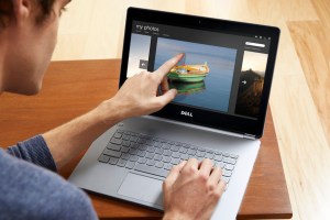 Man Using Notebook in Living Room